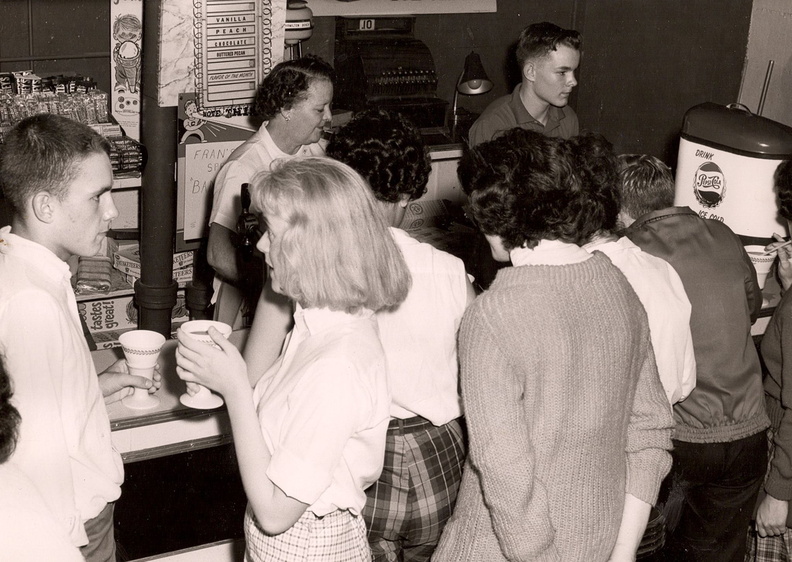 Here is a photo of the canteen in the early '60s when Fran Lenseth ran the snack bar. In this photo, her son Bob Lenseth ('64) is helping her. Canteen.jpg